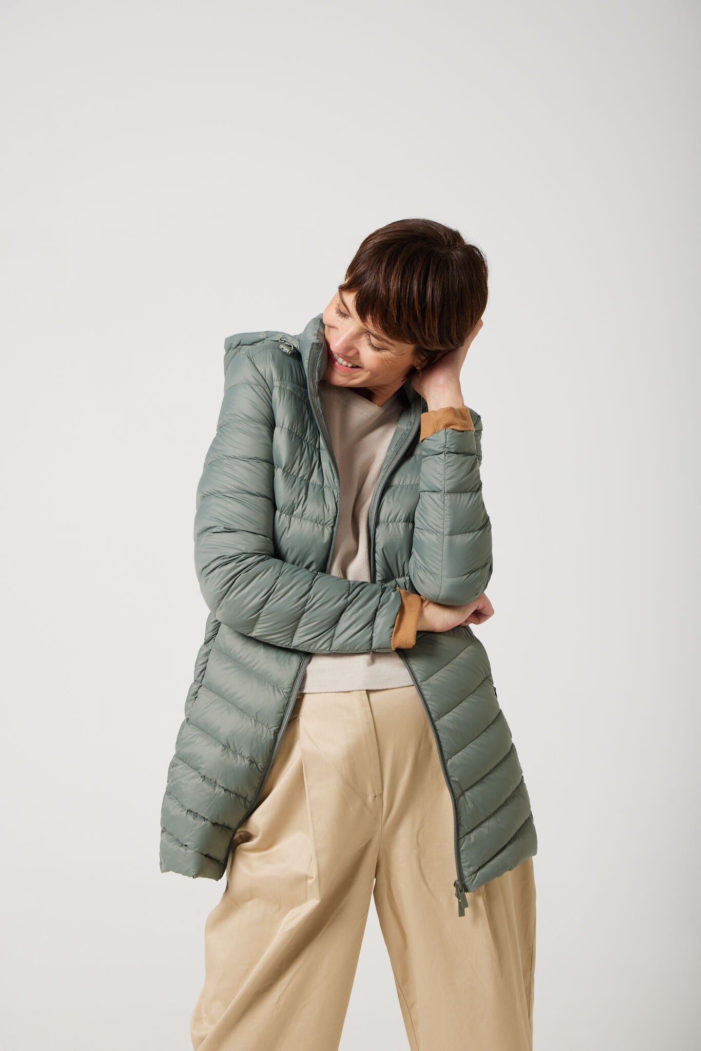 Women’s insulated hooded parka in sage green, designed for warmth and comfort in South Africa’s winter season — Sage Classic Parka™