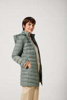 Women’s insulated hooded parka in sage green, designed for warmth and comfort in South Africa’s winter season — Sage Classic Parka™