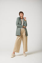 Women’s insulated hooded parka in sage green, designed for warmth and comfort in South Africa’s winter season — Sage Classic Parka™