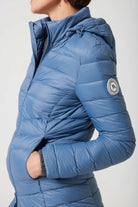 Women’s insulated hooded parka in sky blue, designed for warmth and comfort in South Africa’s winter season — Vista Classic Parka™