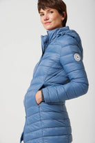 Women’s insulated hooded parka in sky blue, designed for warmth and comfort in South Africa’s winter season — Vista Classic Parka™