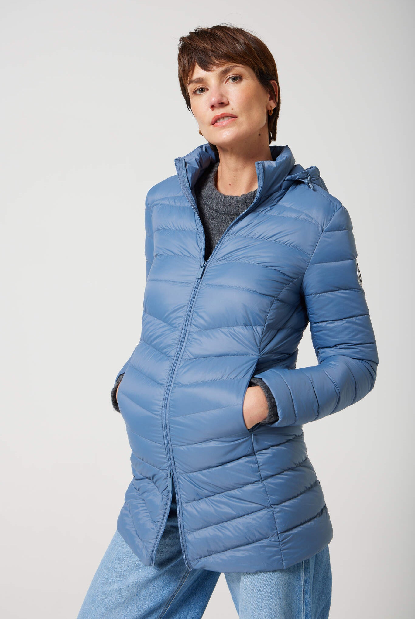 Women’s insulated hooded parka in sky blue, designed for warmth and comfort in South Africa’s winter season — Vista Classic Parka™