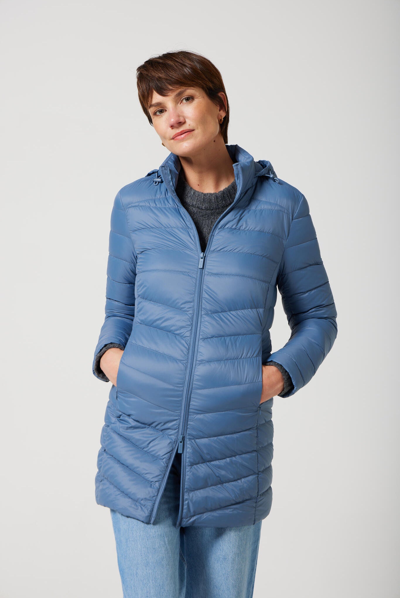 Women’s insulated hooded parka in sky blue, designed for warmth and comfort in South Africa’s winter season — Vista Classic Parka™