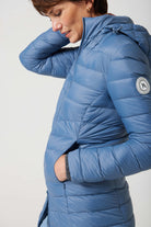 Women’s insulated hooded parka in sky blue, designed for warmth and comfort in South Africa’s winter season — Vista Classic Parka™