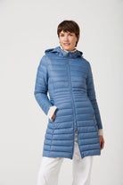 Women’s insulated midi-length hooded parka in sky blue, designed for warmth and comfort in South Africa’s winter season — Vista Midi Parka™