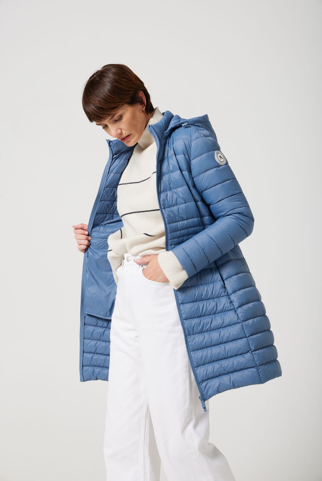 Women’s insulated midi-length hooded parka in sky blue, designed for warmth and comfort in South Africa’s winter season — Vista Midi Parka™