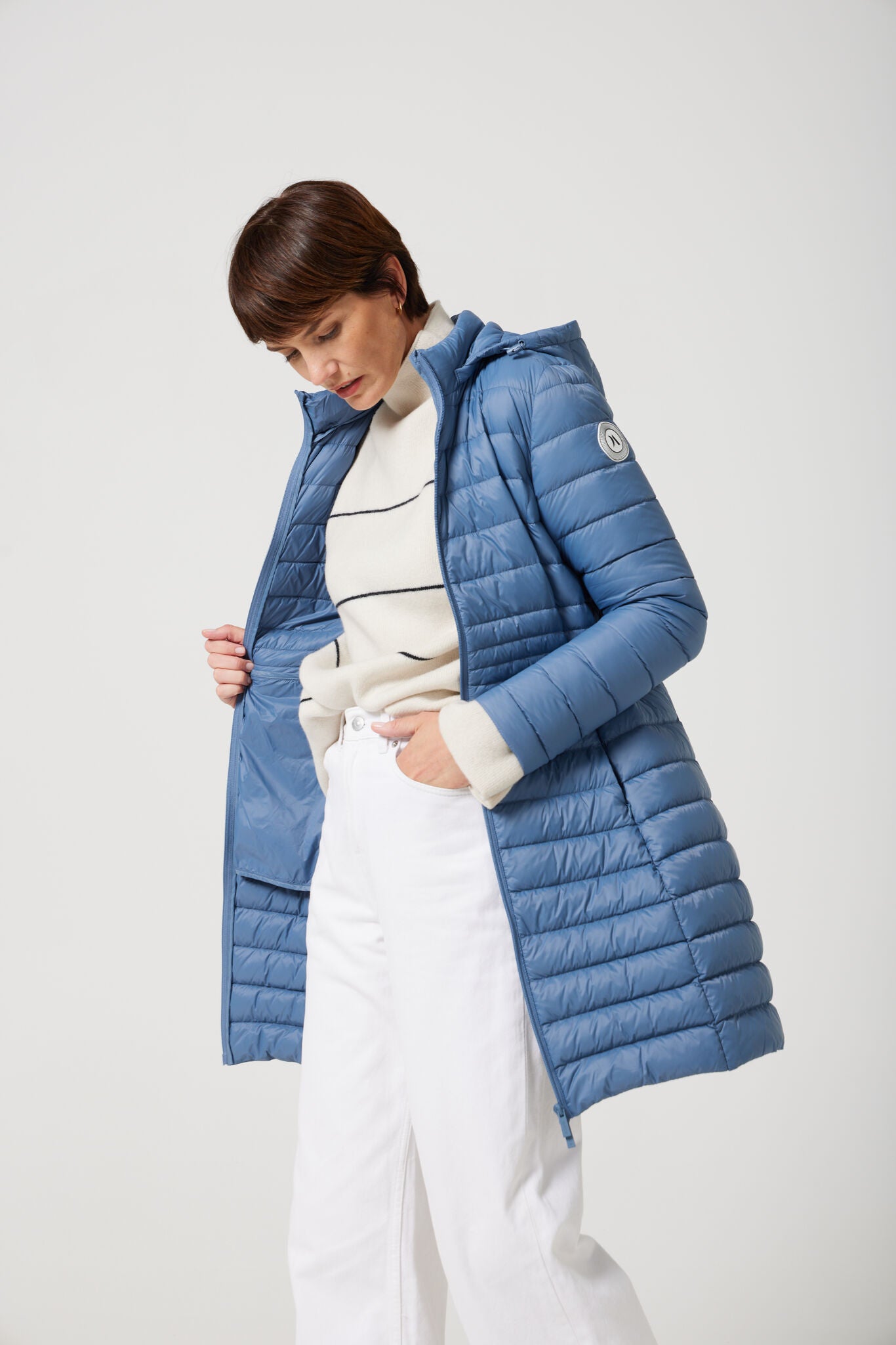 Women’s insulated midi-length hooded parka in sky blue, designed for warmth and comfort in South Africa’s winter season — Vista Midi Parka™