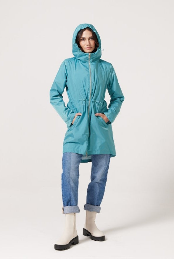 Windsor Azure raincoat in turquoise, lightweight hooded waterproof raincoat ideal for South Africa’s rainy season and wet climate