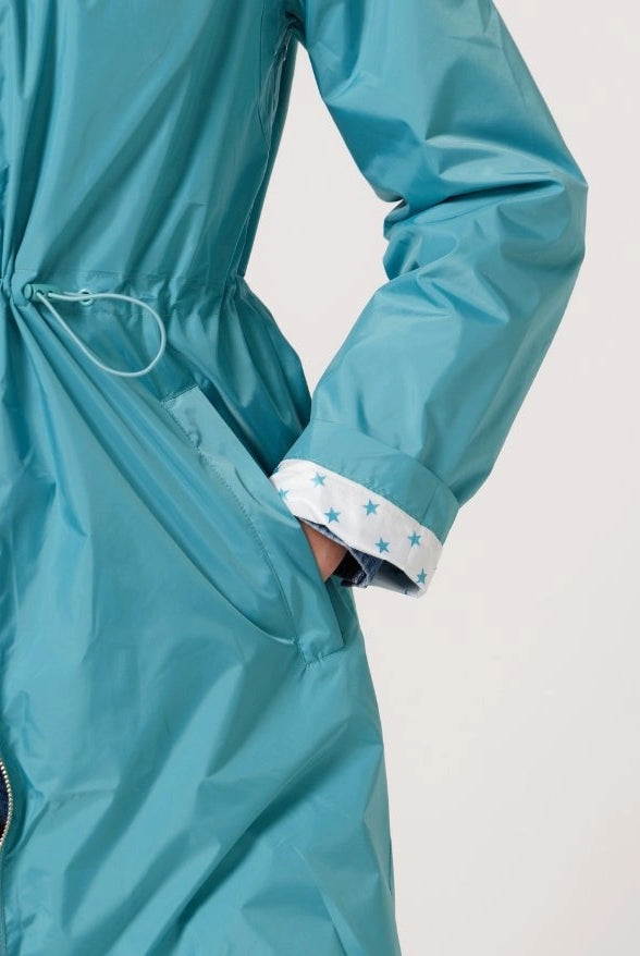 Windsor Azure raincoat in turquoise, lightweight hooded waterproof raincoat ideal for South Africa’s rainy season and wet climate