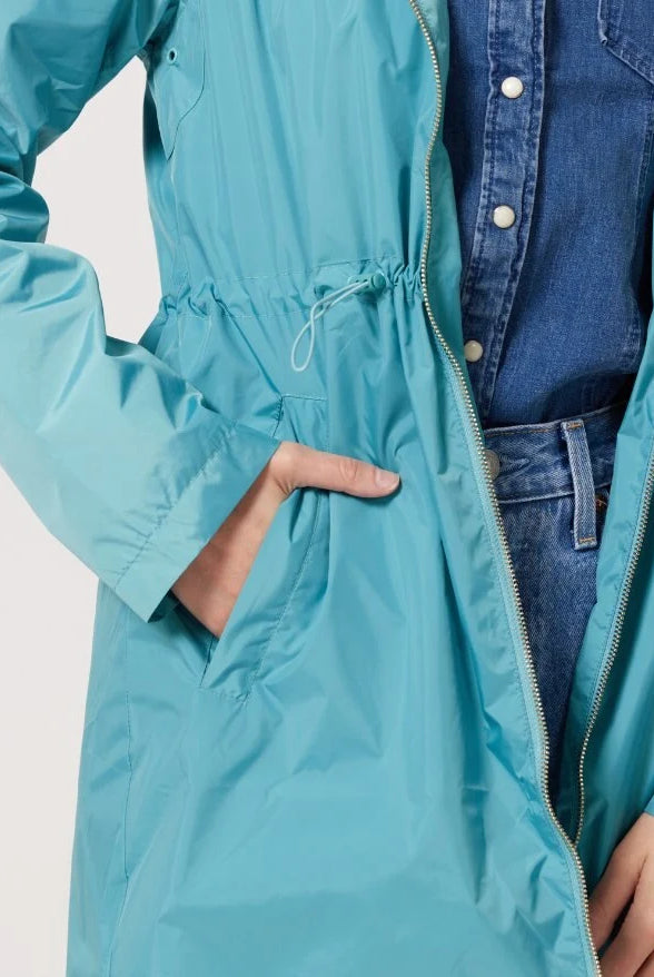 Windsor Azure raincoat in turquoise, lightweight hooded waterproof raincoat ideal for South Africa’s rainy season and wet climate