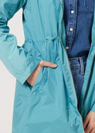 Windsor Azure raincoat in turquoise, lightweight hooded waterproof raincoat ideal for South Africa’s rainy season and wet climate