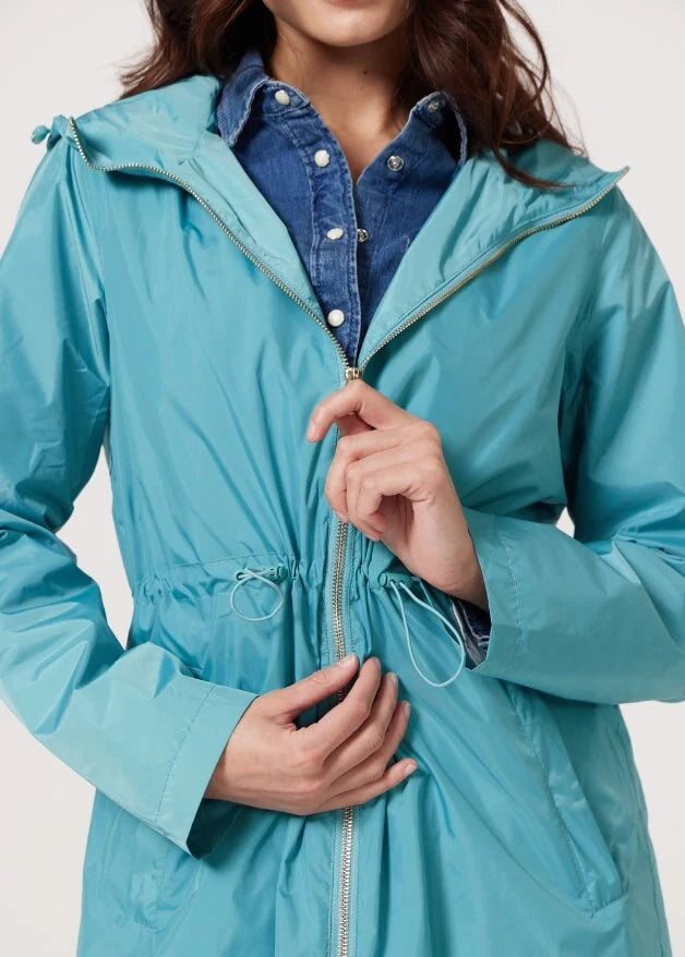 Windsor Azure raincoat in turquoise, lightweight hooded waterproof raincoat ideal for South Africa’s rainy season and wet climate