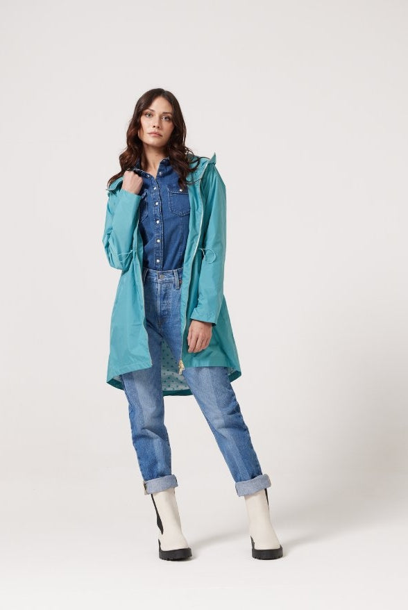 Windsor Azure raincoat in turquoise, lightweight hooded waterproof raincoat ideal for South Africa’s rainy season and wet climate