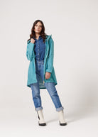 Windsor Azure raincoat in turquoise, lightweight hooded waterproof raincoat ideal for South Africa’s rainy season and wet climate
