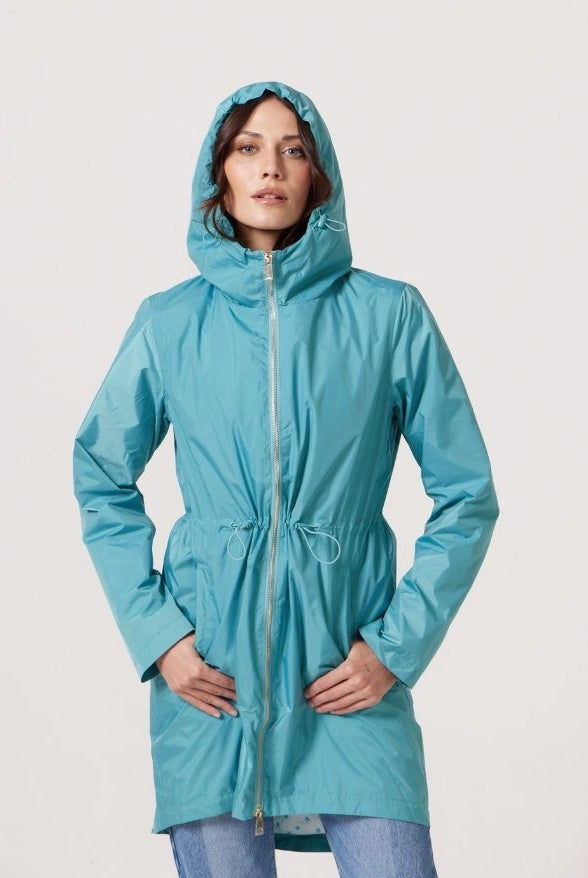 Windsor Azure raincoat in turquoise, lightweight hooded waterproof raincoat ideal for South Africa’s rainy season and wet climate