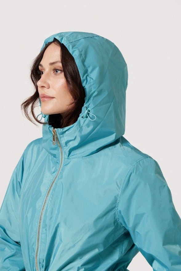 Windsor Azure raincoat in turquoise, lightweight hooded waterproof raincoat ideal for South Africa’s rainy season and wet climate