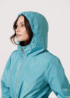Windsor Azure raincoat in turquoise, lightweight hooded waterproof raincoat ideal for South Africa’s rainy season and wet climate