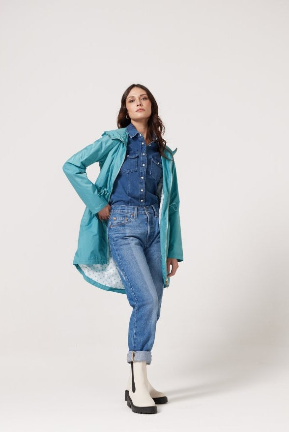 Windsor Azure raincoat in turquoise, lightweight hooded waterproof raincoat ideal for South Africa’s rainy season and wet climate