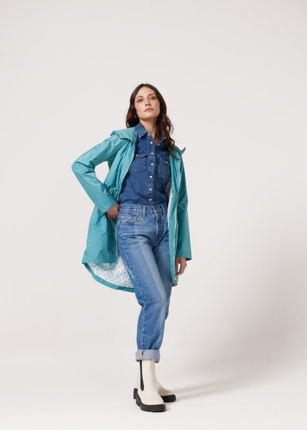 Windsor Azure raincoat in turquoise, lightweight hooded waterproof raincoat ideal for South Africa’s rainy season and wet climate