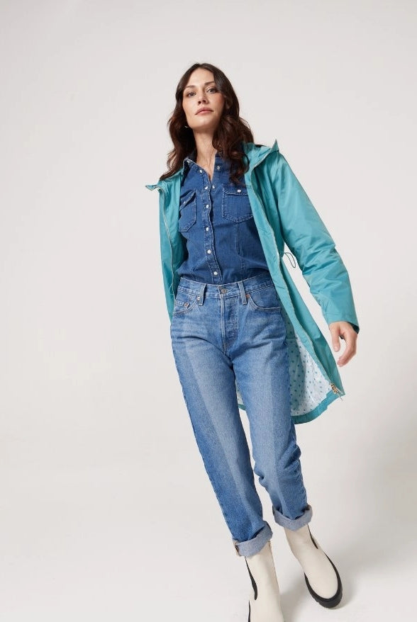 Windsor Azure raincoat in turquoise, lightweight hooded waterproof raincoat ideal for South Africa’s rainy season and wet climate