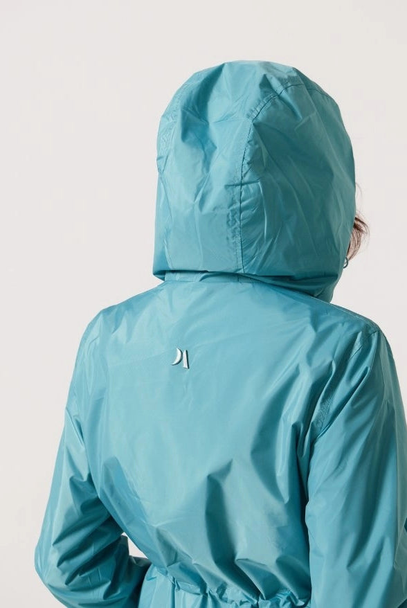 Windsor Azure raincoat in turquoise, lightweight hooded waterproof raincoat ideal for South Africa’s rainy season and wet climate