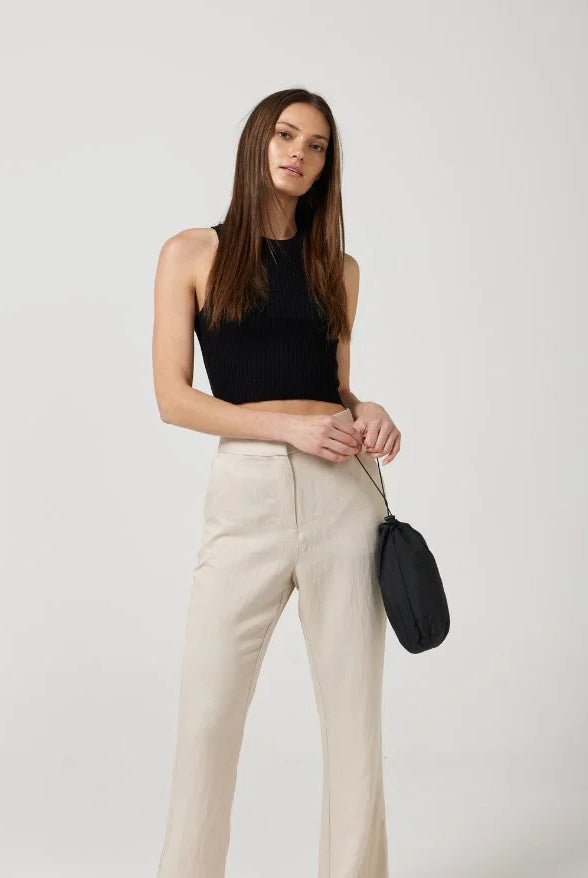 The Highland Midnight raincoat in classic black, lightweight hooded waterproof raincoat ideal for South Africa’s rainy season and wet climate