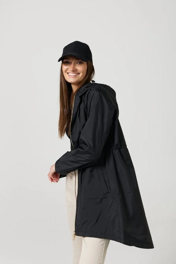 The Highland Midnight raincoat in classic black, lightweight hooded waterproof raincoat ideal for South Africa’s rainy season and wet climate