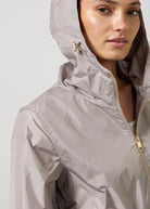The Cairo Sands raincoat in beige, lightweight hooded waterproof raincoat ideal for South Africa’s rainy season and wet climate