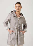 The Cairo Sands raincoat in beige, lightweight hooded waterproof raincoat ideal for South Africa’s rainy season and wet climate