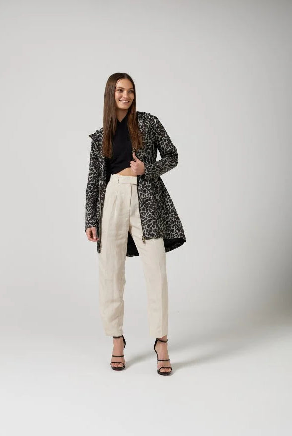 The Cape Leopard raincoat in animal print, lightweight hooded waterproof raincoat ideal for South Africa’s rainy season and wet climate