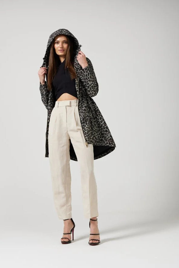 The Cape Leopard raincoat in animal print, lightweight hooded waterproof raincoat ideal for South Africa’s rainy season and wet climate