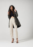 The Cape Leopard raincoat in animal print, lightweight hooded waterproof raincoat ideal for South Africa’s rainy season and wet climate