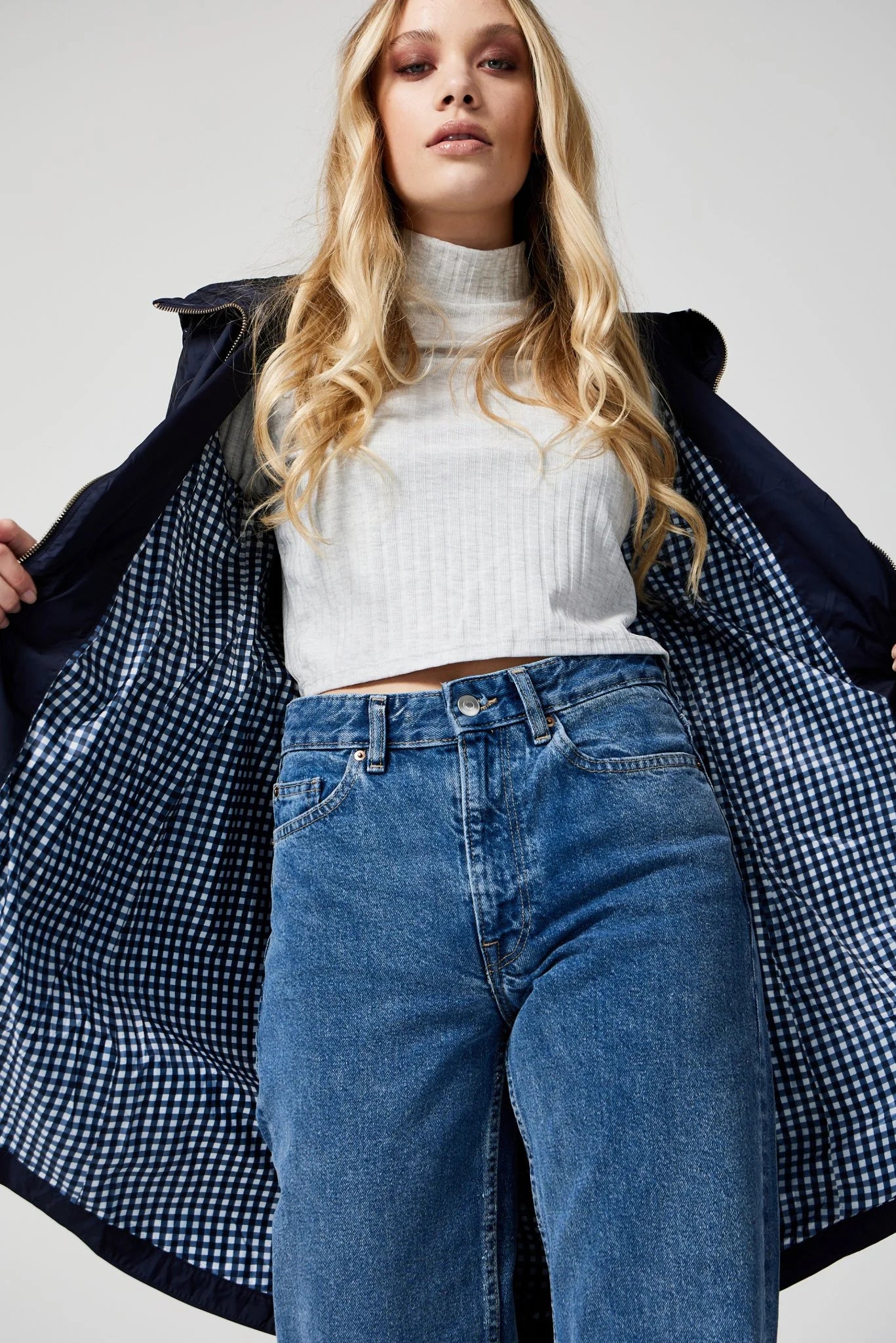 The Oxford Blue raincoat in navy blue, lightweight hooded waterproof raincoat ideal for South Africa’s rainy season and wet climate