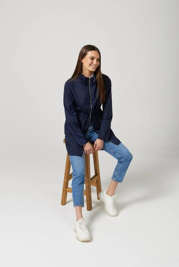 The Oxford Blue raincoat in navy blue, lightweight hooded waterproof raincoat ideal for South Africa’s rainy season and wet climate