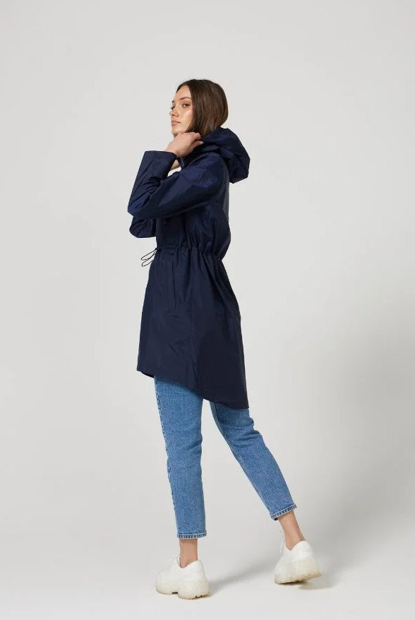 The Oxford Blue raincoat in navy blue, lightweight hooded waterproof raincoat ideal for South Africa’s rainy season and wet climate