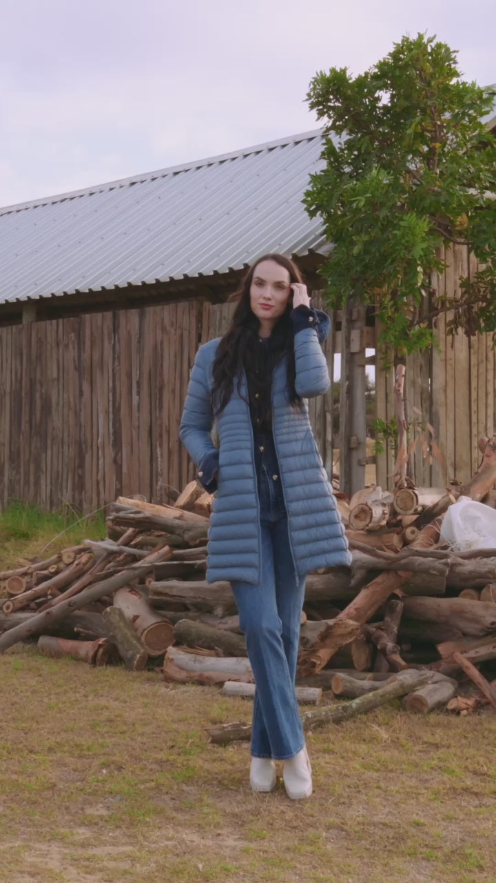 Women’s insulated midi-length hooded parka in sky blue, designed for warmth and comfort in South Africa’s winter season — Vista Midi Parka™