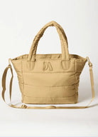 Puffer Tote Bag — quilted tan tote with padded handles, detachable shoulder strap,