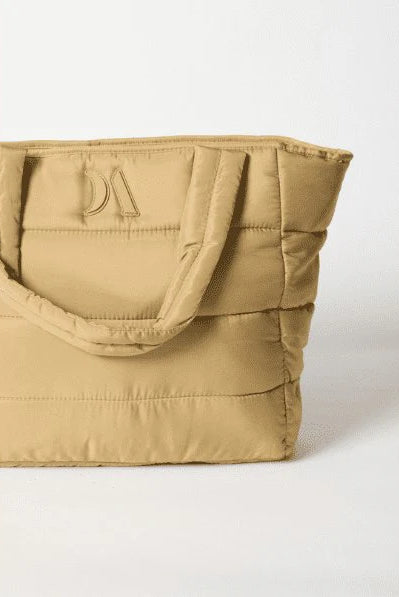 Puffer Tote Bag — quilted tan tote with padded handles, detachable shoulder strap,
