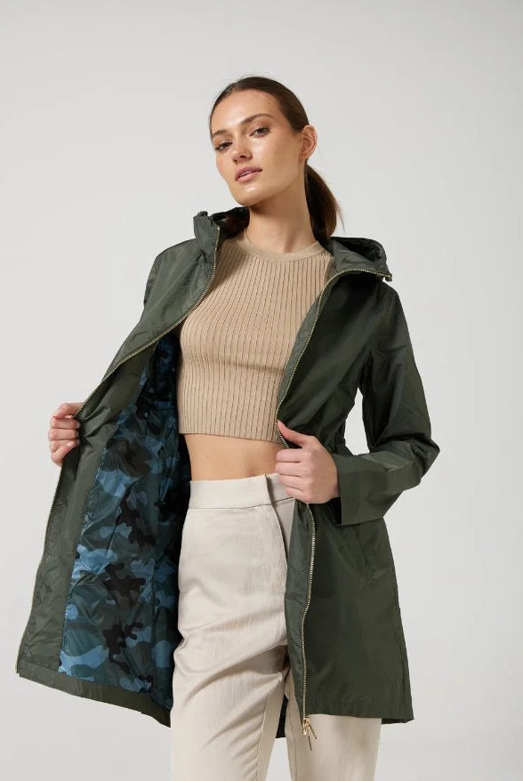 The Juniper raincoat in deep green, lightweight hooded waterproof raincoat ideal for South Africa’s rainy season and wet climate