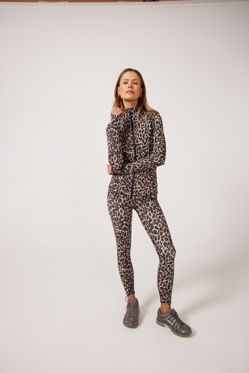 Leopard Lightweight performance jacket with a smooth, sculpting fit, full zip front, high collar, and stretch fabric designed for everyday movement and layering.