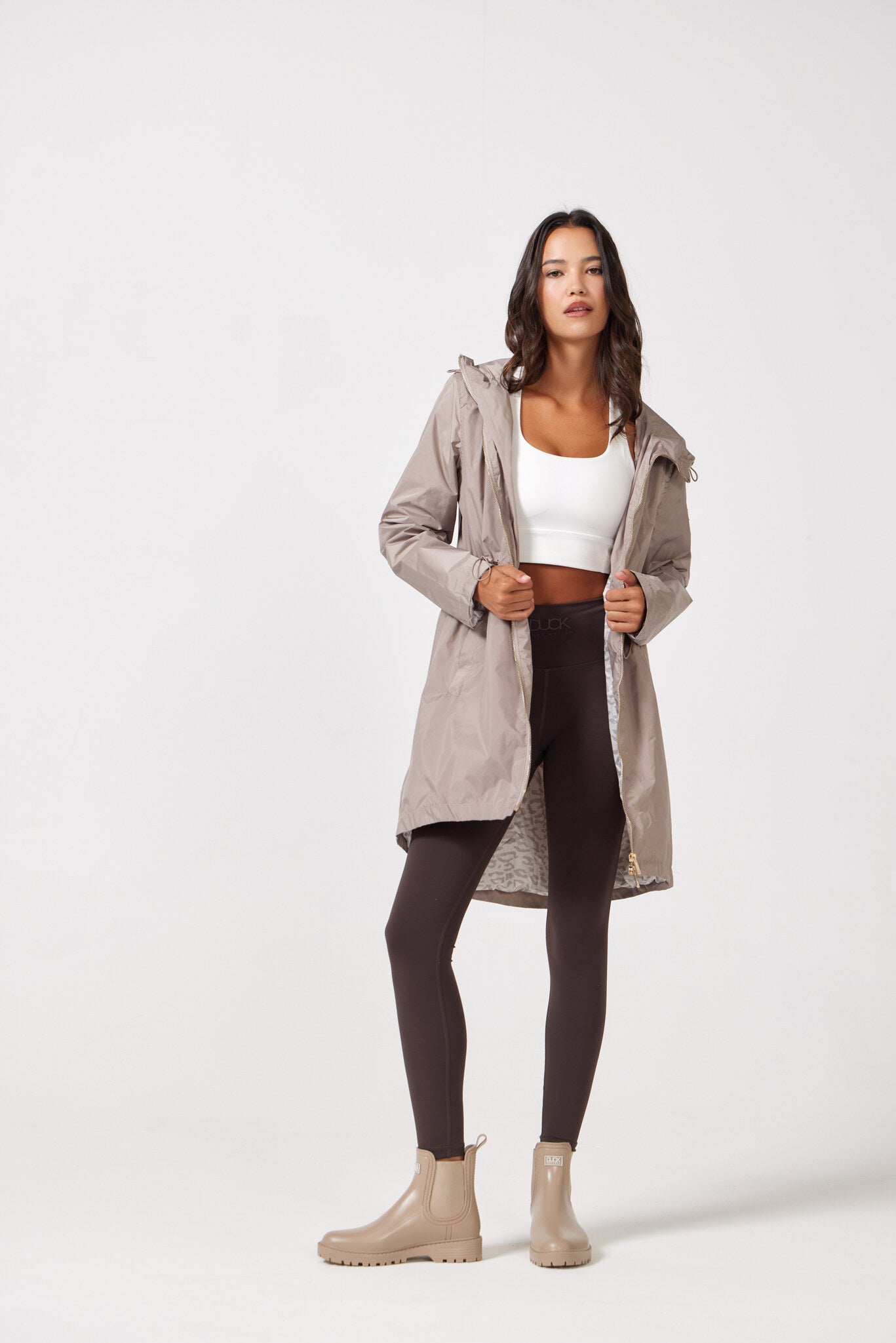 The Cairo Sands raincoat in beige, lightweight hooded waterproof raincoat ideal for South Africa rainy season and wet climate