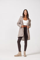 The Cairo Sands raincoat in beige, lightweight hooded waterproof raincoat ideal for South Africa rainy season and wet climate