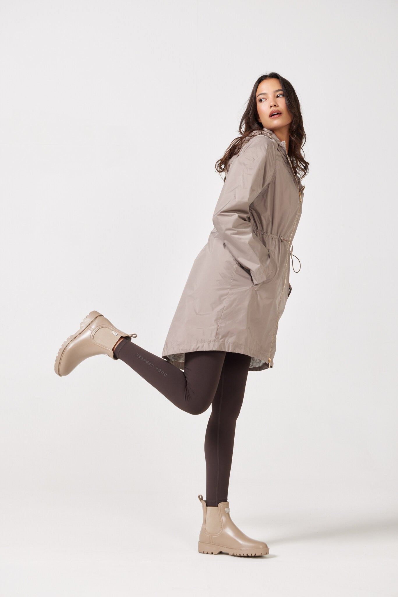 The Cairo Sands raincoat in beige, lightweight hooded waterproof raincoat ideal for South Africa rainy season and wet climate