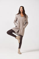 The Cairo Sands raincoat in beige, lightweight hooded waterproof raincoat ideal for South Africa rainy season and wet climate