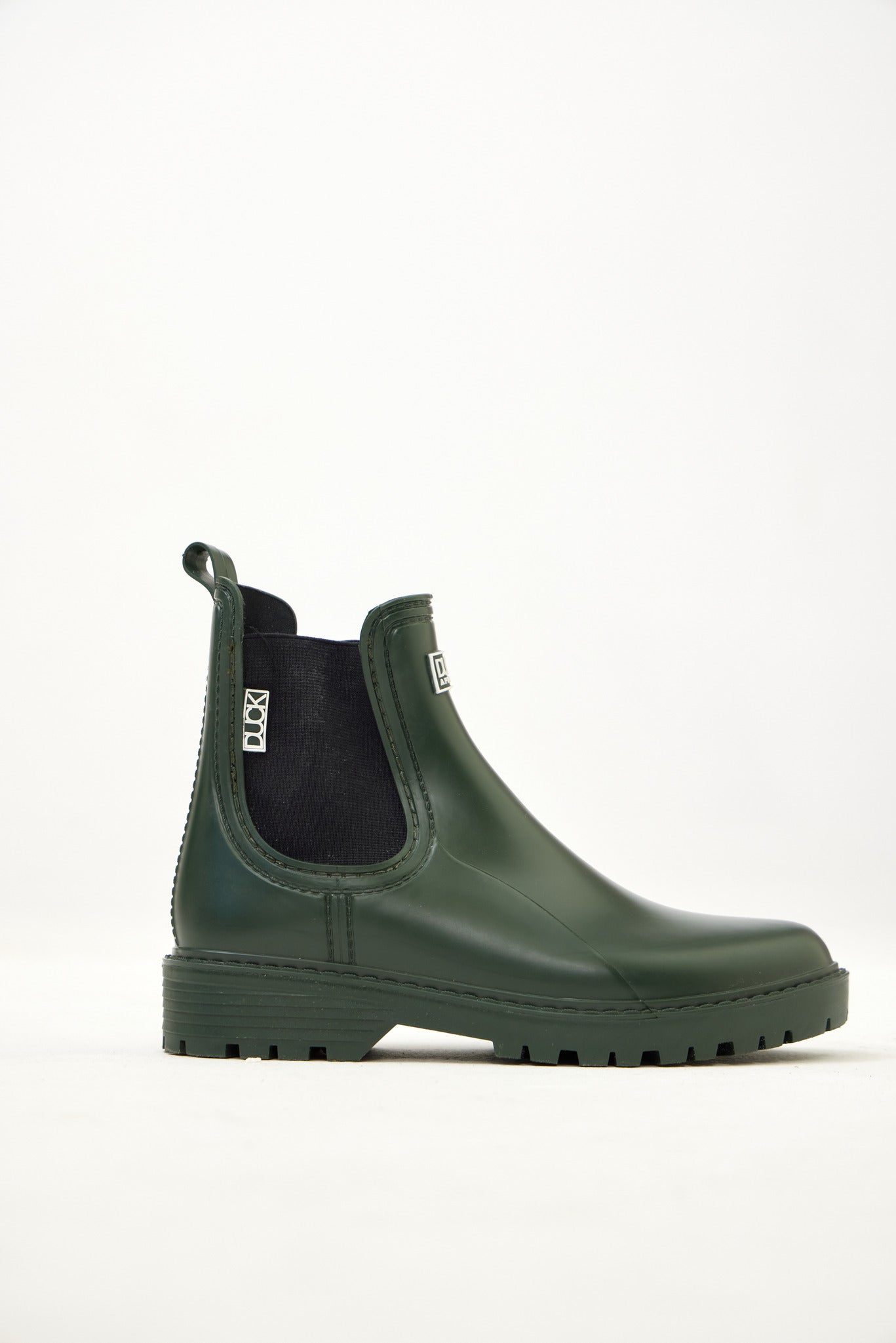 Green Ankle-length gumboots with elastic side panels and durable sole, designed for everyday outdoor and wet-weather use