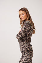 Leopard Lightweight performance jacket with a smooth, sculpting fit, full zip front, high collar, and stretch fabric designed for everyday movement and layering.