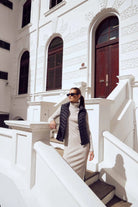 Midnight Classic Gilet™ — women’s sleeveless puffer vest in sleek midnight black, lightweight and versatile for layering in South Africa.