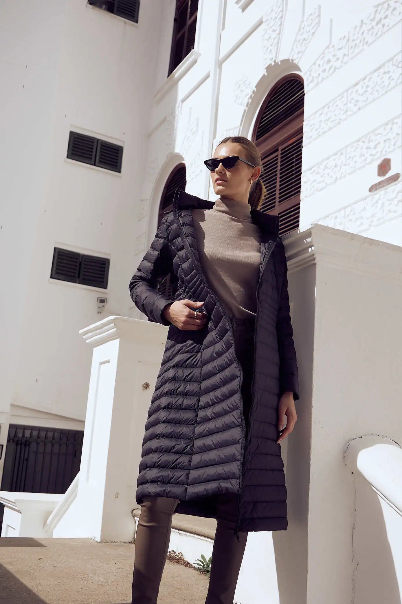 Women’s insulated ultra-length hooded parka in midnight black, designed for extra warmth and comfort in South Africa’s winter season — Midnight Ultra Parka™