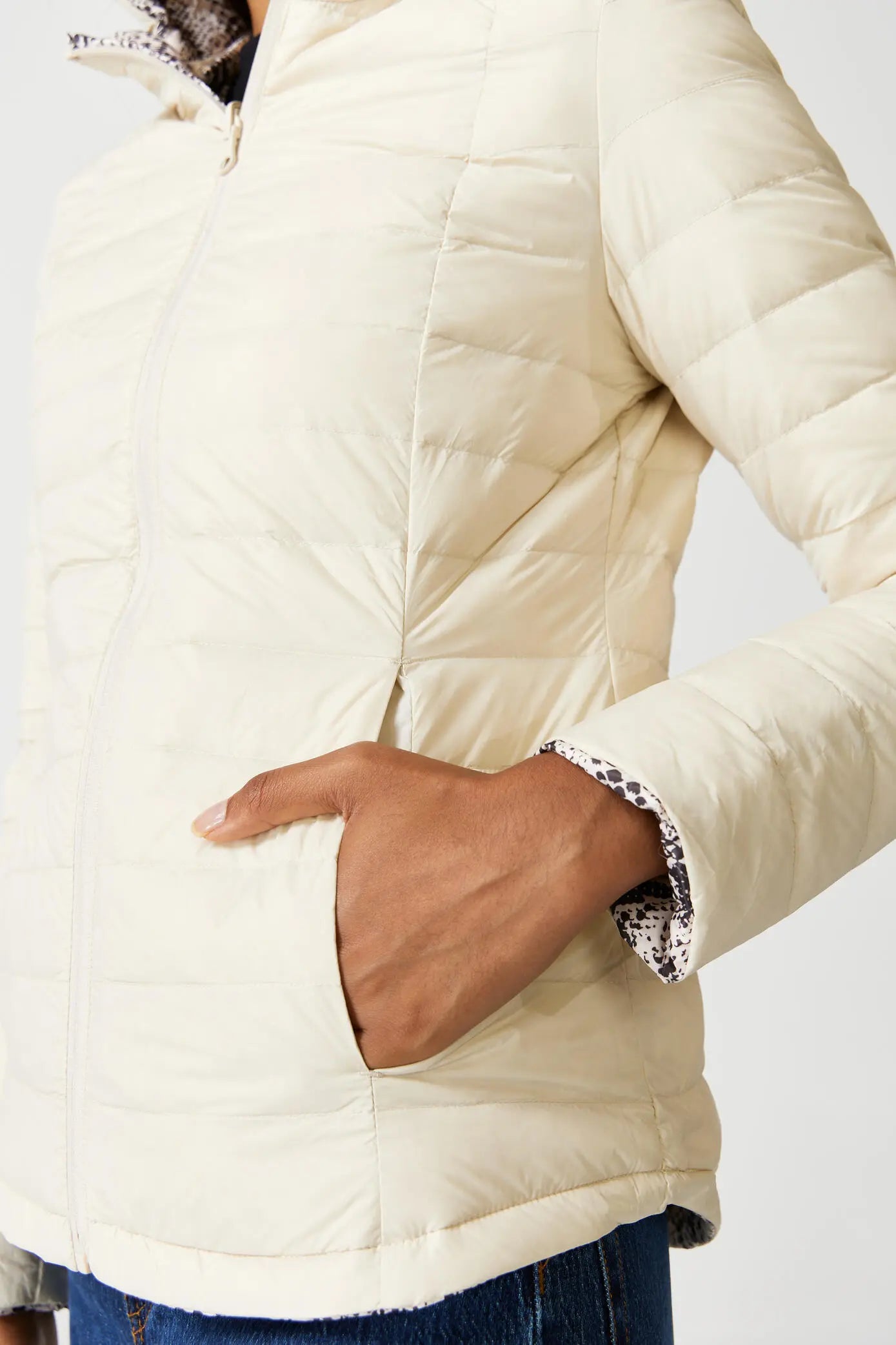 Women’s reversible cream puffer jacket with python-print inner lining and hood, lightweight insulated outerwear from Duck Apparel South Africa