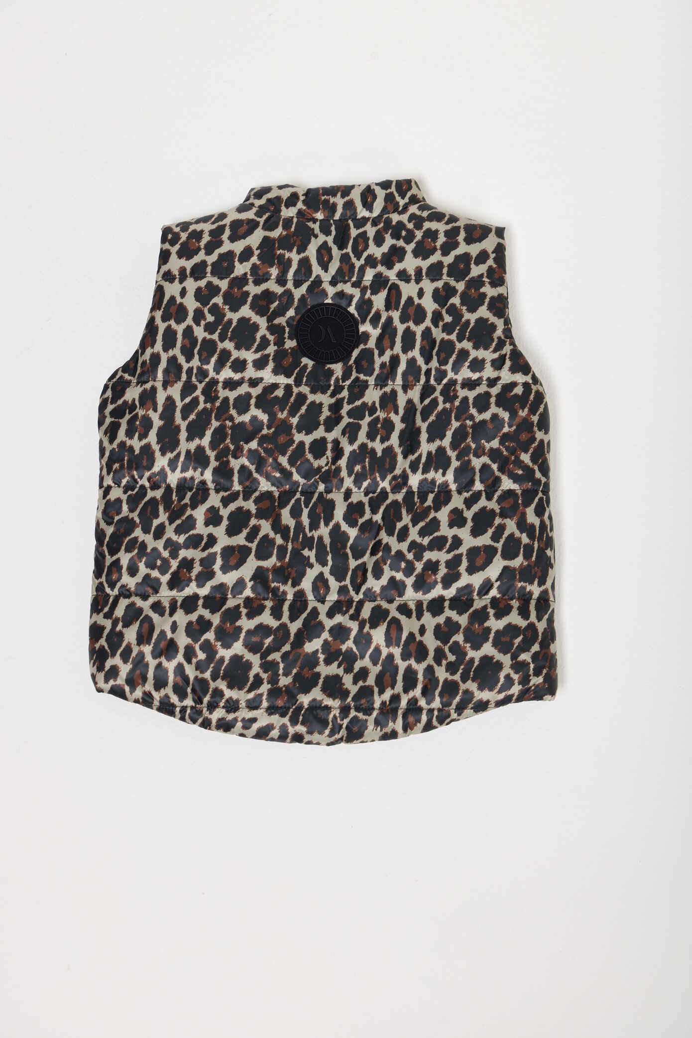 Kids Leopard x Black Gilet™ — sleeveless kids’ puffer vest in bold leopard print with black accents, a fun winter essential in South Africa